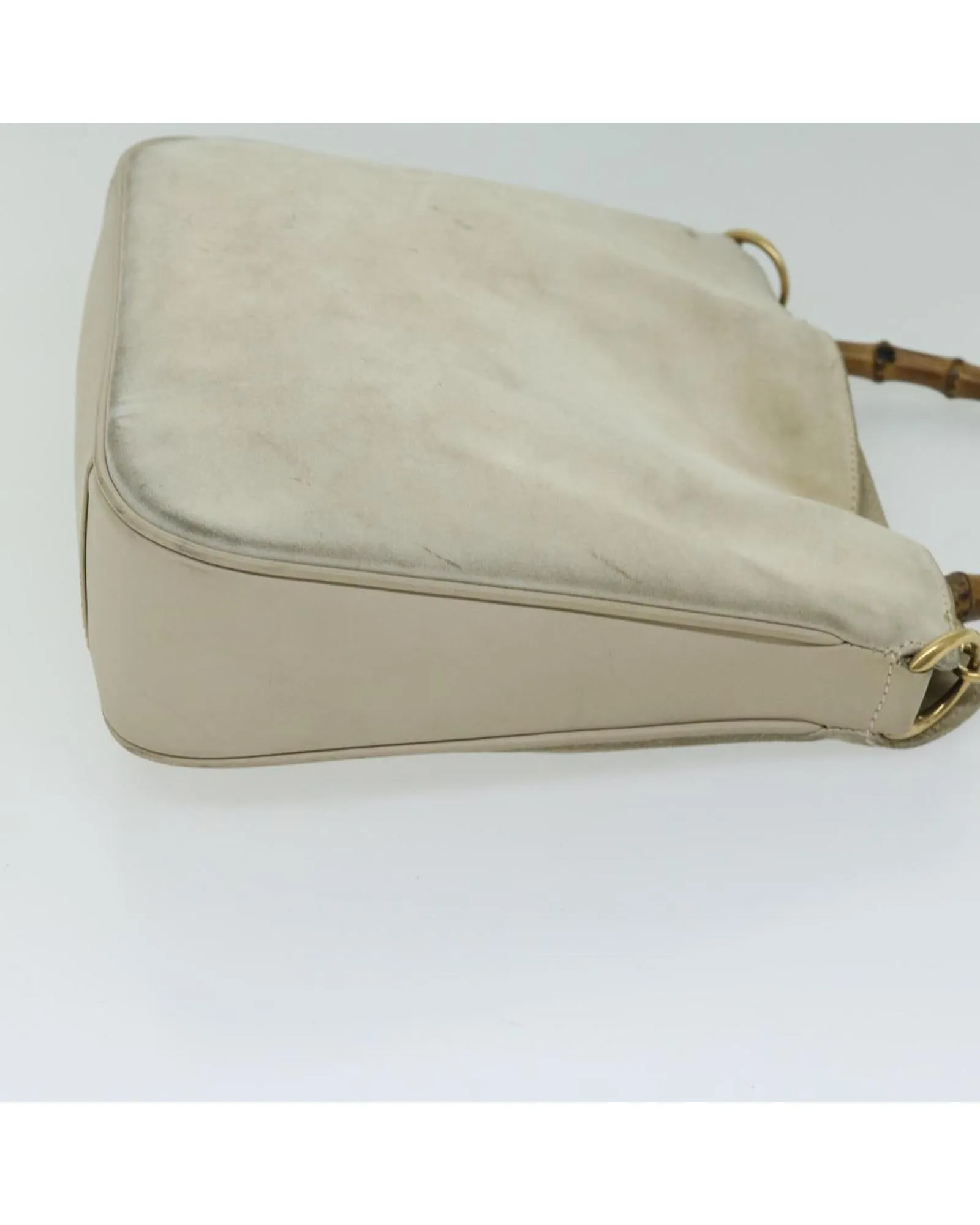 Chic Suede Shoulder Bag with Unique Bamboo Detailing