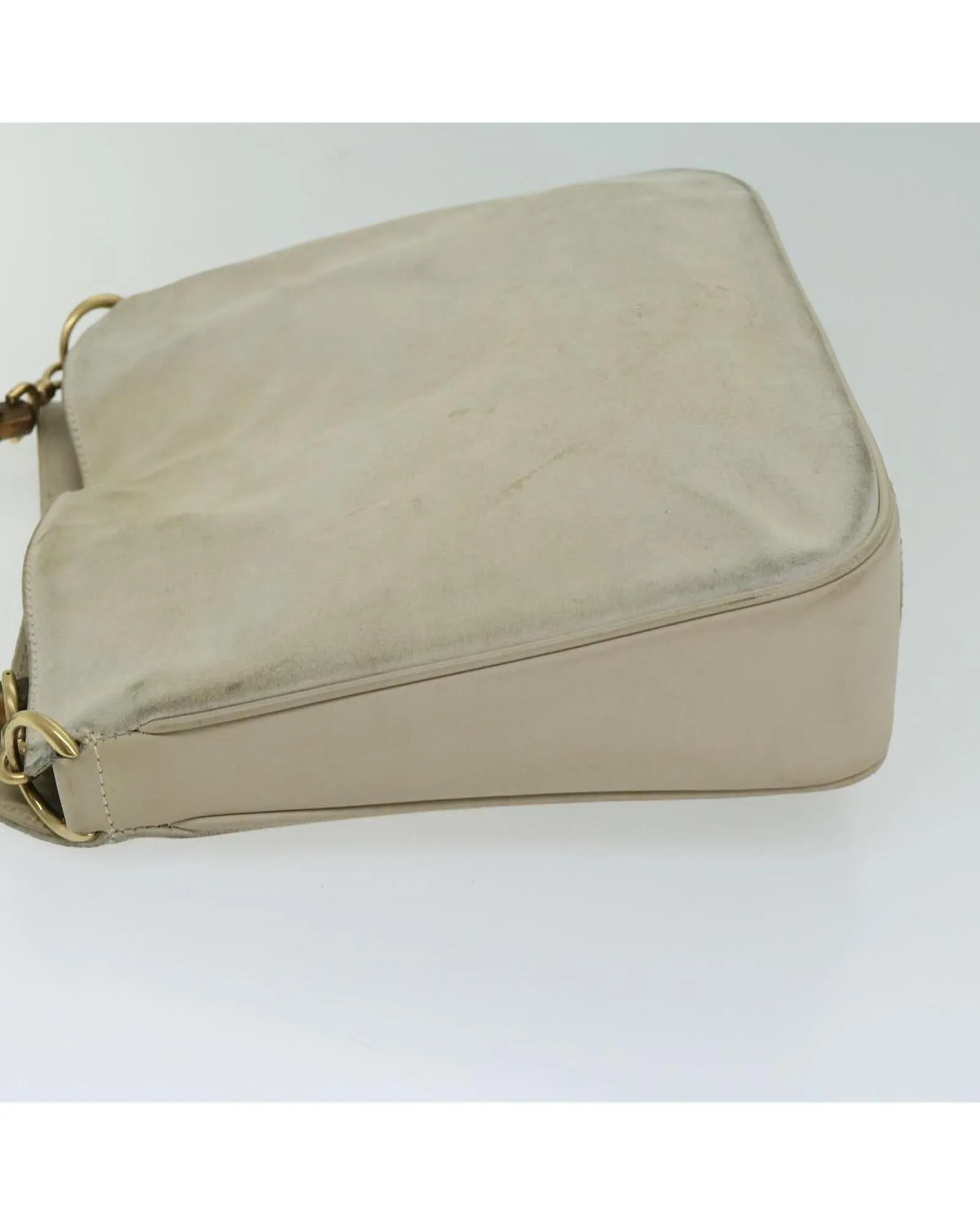 Chic Suede Shoulder Bag with Unique Bamboo Detailing