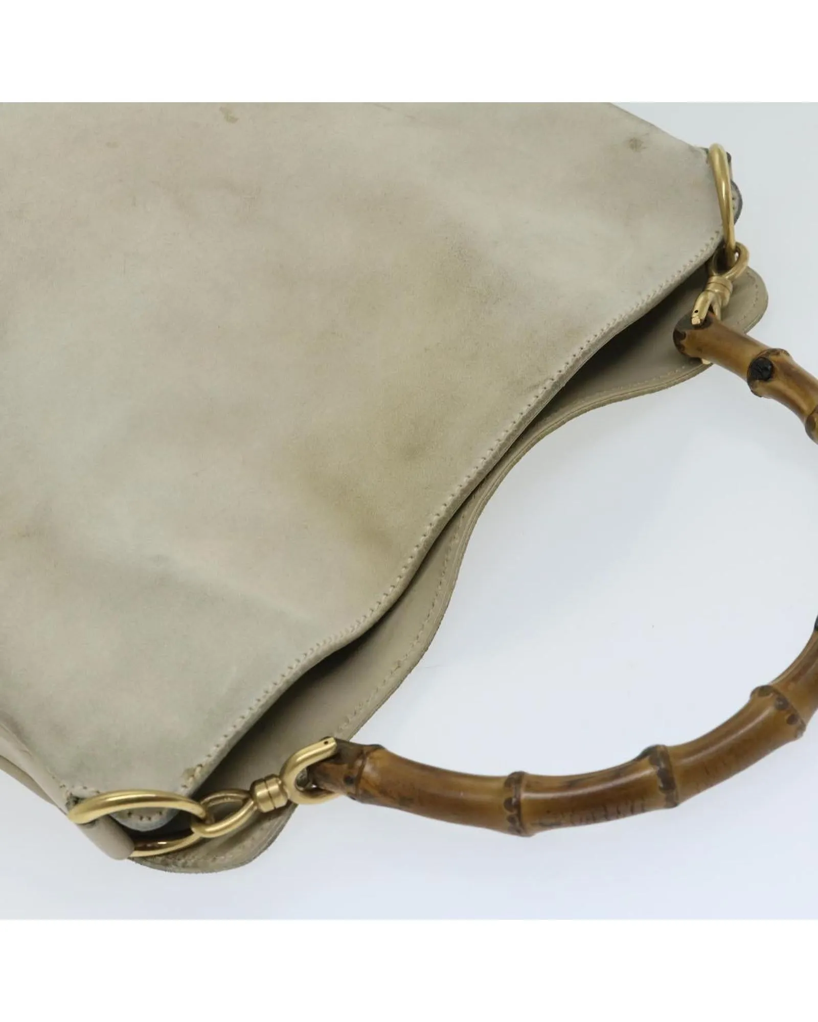 Chic Suede Shoulder Bag with Unique Bamboo Detailing