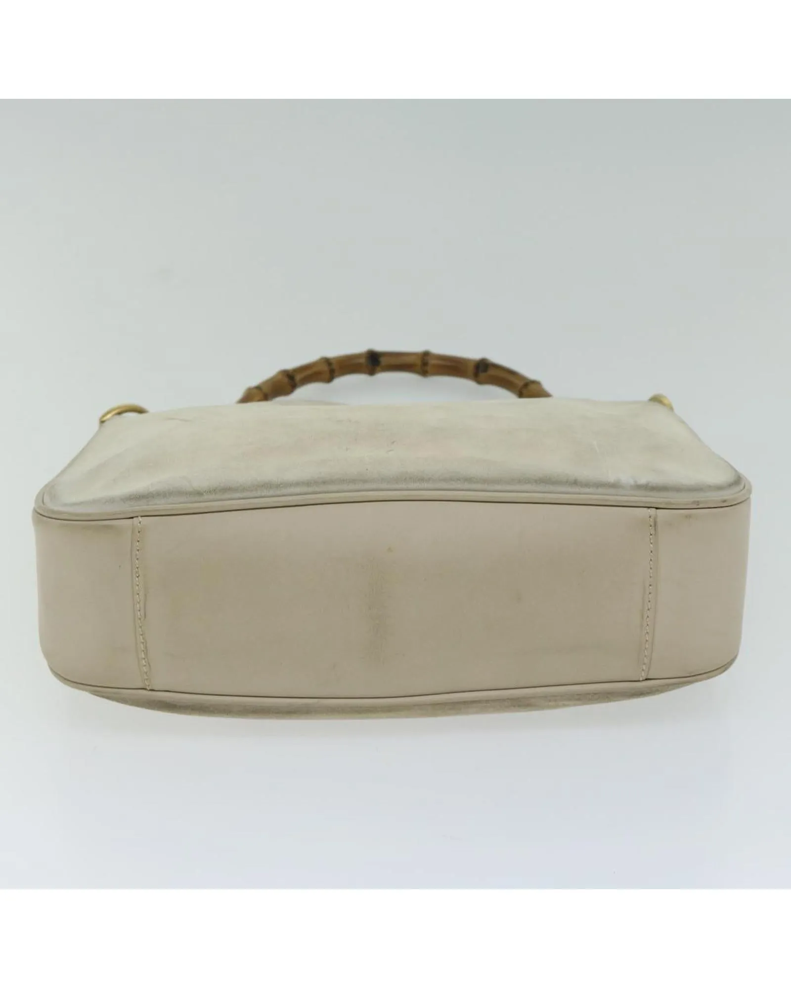 Chic Suede Shoulder Bag with Unique Bamboo Detailing