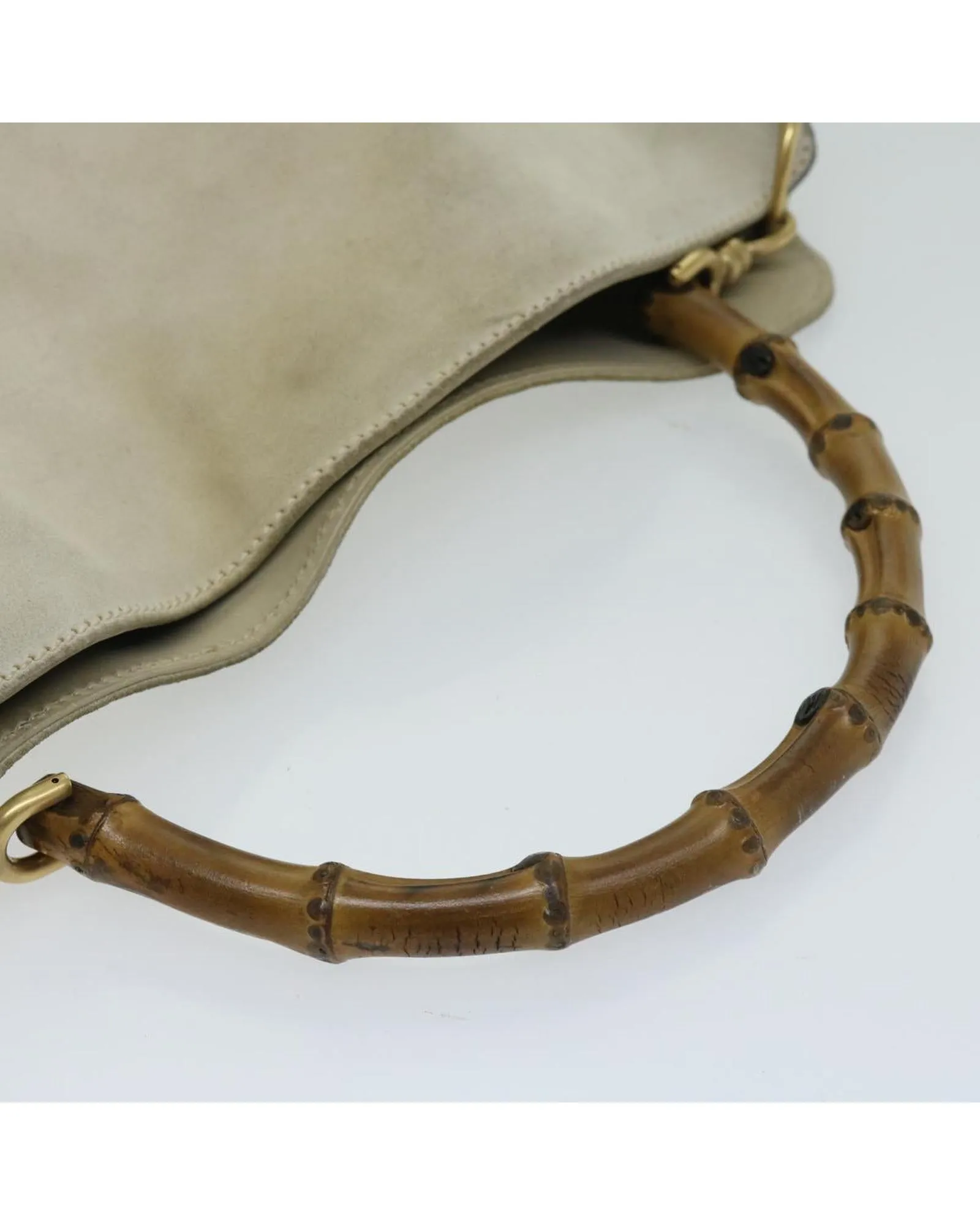 Chic Suede Shoulder Bag with Unique Bamboo Detailing